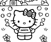 Coloriage Hello Kitty dans le jardin