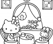 Coloriage et dessins gratuit Hello Kitty lit une lettre à imprimer