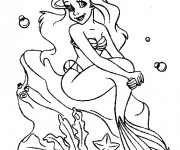 Coloriage Princesse Ariel sur un rocher dans la mer