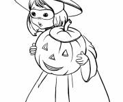 Coloriage Petite fille d'halloween avec sa citrouille