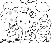 Coloriage Hello Kitty s'amuse dans le jardin