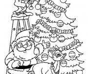 Coloriage Père Noël décore le Sapin