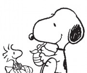 Coloriage Snoopy décore les Oeufs