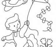 Coloriage et dessins gratuit Enfant avec le Cerf-Volant à imprimer