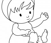 Coloriage et dessins gratuit Bébé en jouant avec ses mains à imprimer