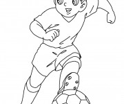 Coloriage et dessins gratuit Un jeune joueur de foot à imprimer