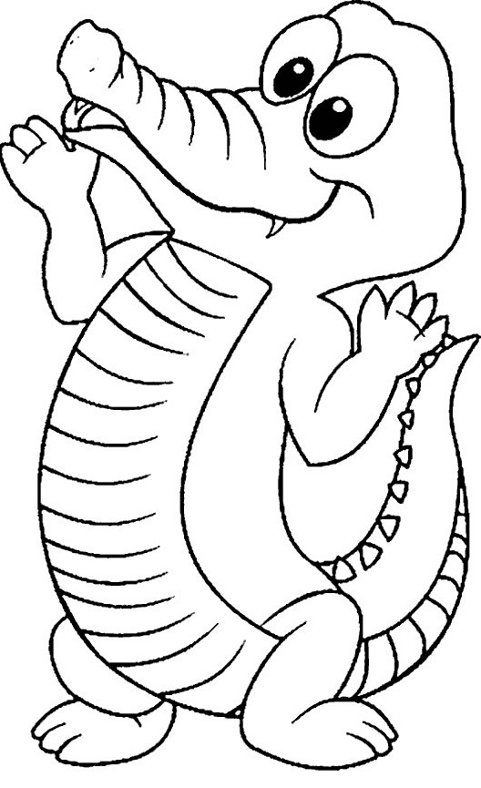 Coloriage et dessins gratuits Un petit Crocodile lève ses bras à imprimer