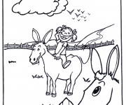 Coloriage Une fille sur un &acirc;ne