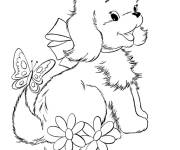 Coloriage Gentil chiot et le papillon mignon dans la nature