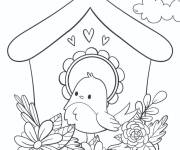 Coloriage Oiseau mignon devant sa petite maison