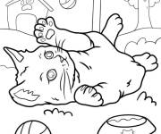 Coloriage Chaton roulant sur l'herbe