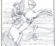 Coloriage Cowboy et son cheval cabr&eacute;