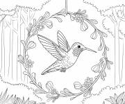 Coloriage Colibri dans une couronne suspendue à une branche d’arbre