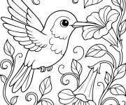 Coloriage Colibri entour&eacute; par des belles fleurs