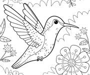 Coloriage Colibri mignon volant dans un jardin fleuri