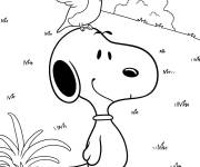Coloriage Snoopy avec un colibri sur la t&ecirc;te