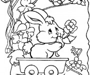 Coloriage Un Lapin qui porte des fleurs