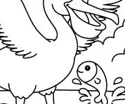 Coloriage P&eacute;lican debout pr&egrave;s d'un poisson qui saute