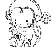 Coloriage Singe petit mange du banane