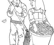 Coloriage Amis ramassent les feuilles d'automne