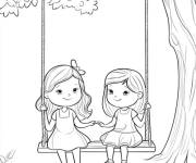 Coloriage Deux amies sur balan&ccedil;oire suspendu sur l'arbre