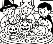 Coloriage Les amis d&eacute;corant les citrouilles de Halloween