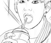 Coloriage Beau gosse buvant de jus