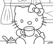 Coloriage Hello Kitty buvant du café