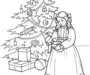 Coloriage Fille revoit le jouet Casse-noisette comme cadeau de noel