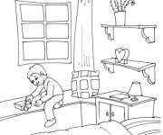 Coloriage Le garçon joue dans sa Chambre