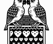 Coloriage Bo&icirc;te de chocolats d&eacute;cor&eacute;e avec des oiseaux