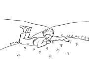 Coloriage Le petit Prince couch&eacute; dans l'herbe