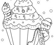 Coloriage Bonhomme en pain d'épice décorant un cupcake de Noël
