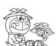 Coloriage et dessins gratuit Doraemon et sa miniature au repas à imprimer