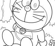 Coloriage Le dr&ocirc;le Doraemon dans le jardin
