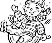 Coloriage Enfant glissant sur une colline pendant la neige