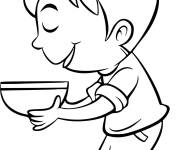Coloriage L'enfant aime la soupe