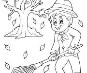 Coloriage L'enfant ramasse les feuilles pendant l'automne