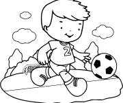 Coloriage Le petit gar&ccedil;on joue au ballon