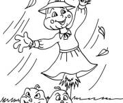 Coloriage Epouvantail s'amuse avec deux citrouilles d'Halloween