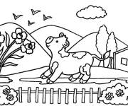 Coloriage Le petit veau s'amuse dans la ferme