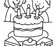 Coloriage C'est le temps de souffler les bougies sur le G&acirc;teau