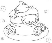 Coloriage Chiot dans un g&acirc;teau aux fraises