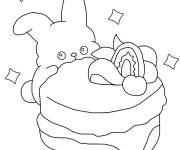 Coloriage Lapin mignon se cache derri&egrave;re le g&acirc;teau