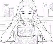 Coloriage Une fille d&eacute;core le g&acirc;teau