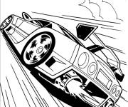 Coloriage La voiture de course sprinte sur la piste