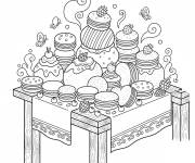 Coloriage Des p&acirc;tisseries macarons sur la tables