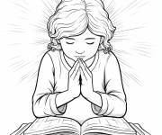 Coloriage Fille fermant ses mains pendant la prière