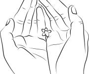 Coloriage Petite fleur dans les mains