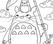 Coloriage Chu Totoro assis sur la tête de Totoro